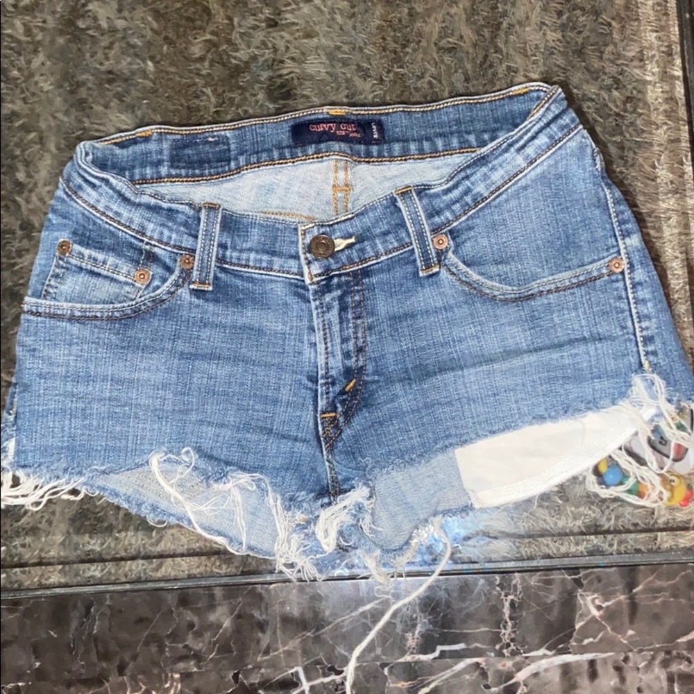 Levi Curvy cut Jean shorts
